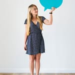 Happy Caucasian woman holding copyspace speech bubble